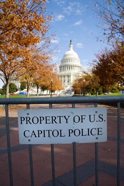 A photo of the US Capitol building, with an overlay text emphasizing the importance of government funding and policy support for retraining programs.